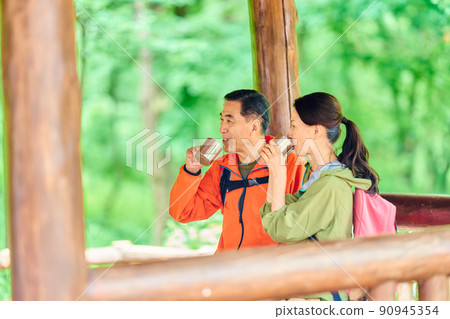 Senior couple taking a break at Higashiya 90945354