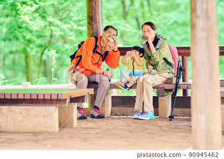 Senior couple resting at Azumaya with their 2-year-old grandson Senior couple resting at Azumaya with their 2-year-old grandson 90945462