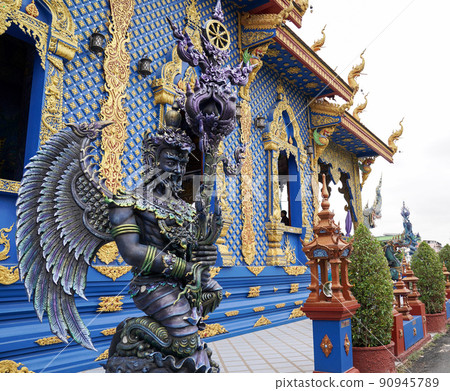 The Blue - Turquiose metalic God statue in Thai blue temple, at the North of Thailand. The Blue - Turquiose metalic God statue in Thai blue temple, at the North of Thailand. 90945789