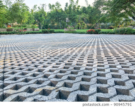 gray color stone brick block floor tile with green grass and sand as background or texture. gray color stone brick block floor tile with green grass and sand as background or texture. 90945791