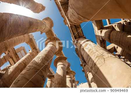 Different hieroglyphs on the walls and columns in the Karnak temple. Karnak temple is the largest complex in ancient Egypt. 90949469
