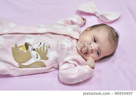 Baby Girl with white Flower Headband. 2-month-old baby girl. 90950497