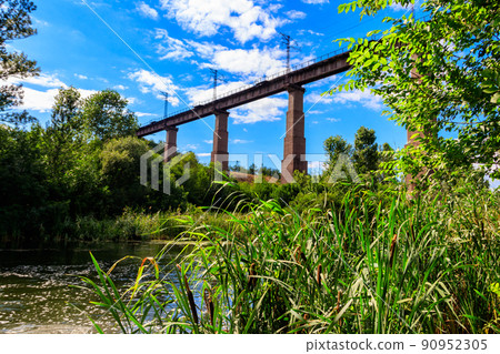 Railway Bridge viaduct across the Inhulets river in Kryvyi Rih, Ukraine 90952305
