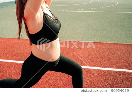 Pregnancy fitness. Prenatal healthy fitness active fit gym outside. Pregnant woman training yoga sport exercise. Prenatal Gymnastics. Pregnancy fitness. Prenatal healthy fitness active fit gym outside. Pregnant woman training yoga sport exercise. Prenatal Gymnastics. 90954059