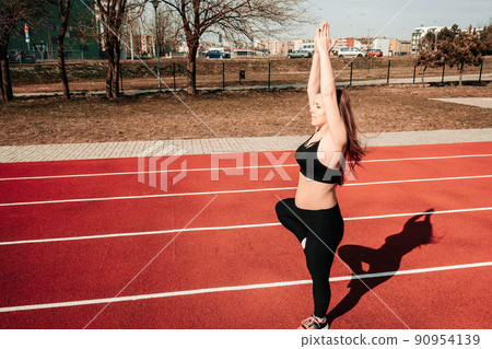 Prenatal gymnastics. Pregnant woman training yoga sport exercise. Prenatal healthy fitness active fit gym outside. Pregnancy fitness. Prenatal gymnastics. Pregnant woman training yoga sport exercise. Prenatal healthy fitness active fit gym outside. Pregnancy fitness. 90954139