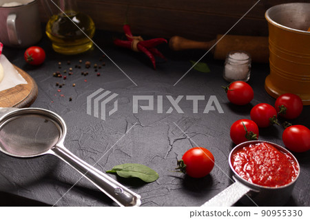 Chilly pepper and tomato sauce ingredient for homemade ketchup at table. Chilli and food Chilly pepper and tomato sauce ingredient for homemade ketchup at table. Chilli and food 90955330