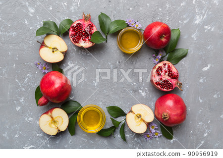 Rosh hashanah concept. Frame made of symbols jewish New Year holiday Traditional. Top view with copy space Rosh hashanah concept. Frame made of symbols jewish New Year holiday Traditional. Top view with copy space 90956919