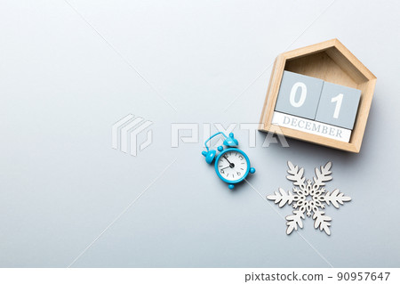 Christmas wood calendar with new year decorations, aganist colored background. Christmas calendar 1 december Christmas wood calendar with new year decorations, aganist colored background. Christmas calendar 1 december 90957647