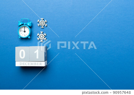 Christmas wood calendar with new year decorations, aganist colored background. Christmas calendar 1 december Christmas wood calendar with new year decorations, aganist colored background. Christmas calendar 1 december 90957648