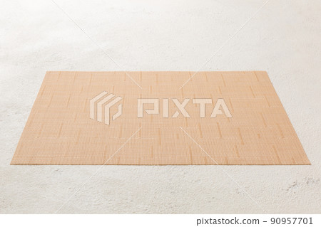 Perspective view of tablecloth for food on cement background. Empty space for your design 90957701