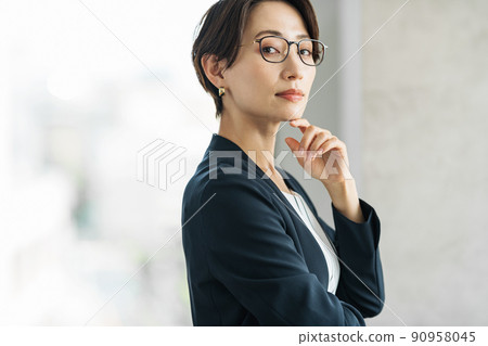 Career woman with glasses Career woman with glasses 90958045