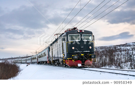 Passenger train at Abisko in Swedish Lapland in winter Passenger train at Abisko in Swedish Lapland in winter 90958349