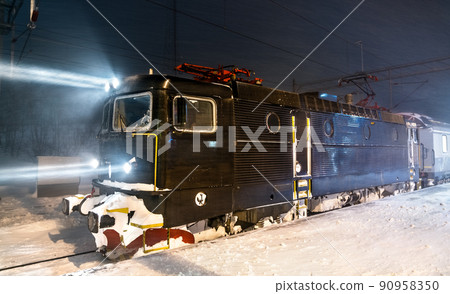 Passenger train at Abisko Ostra Railway Station in Swedish Lapland during snowstorm Passenger train at Abisko Ostra Railway Station in Swedish Lapland during snowstorm 90958350