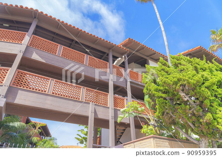 Covered building foorbridges with textured railings at La Jolla, San Diego, California 90959395