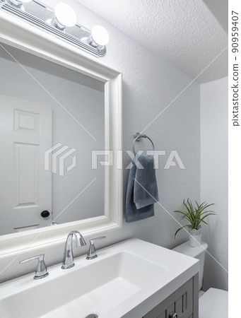 Vertical Bathroom design with plain white walls and vanity sink Vertical Bathroom design with plain white walls and vanity sink 90959407