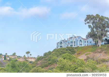 Townhouses on top of the slope at Carlsbad in San Diego, California 90959450