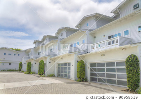 Garage exterior of townhouses at Carlsbad in San Diego, California Garage exterior of townhouses at Carlsbad in San Diego, California 90959519
