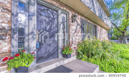 Pano Beautiful house on real estate estate with lockbox on the handle of front door Pano Beautiful house on real estate estate with lockbox on the handle of front door 90959748