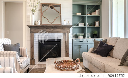 Pano Living room couch table and armchairs against window fireplace and cabinet Pano Living room couch table and armchairs against window fireplace and cabinet 90959762