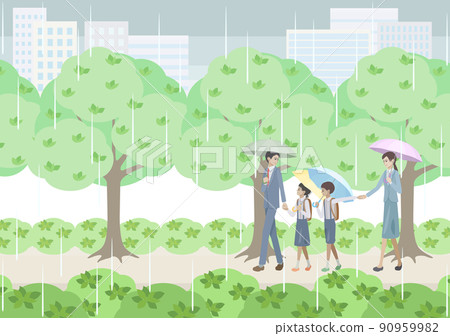 Men and women and elementary school students walking on a green road with the city in the background on a rainy day 90959982
