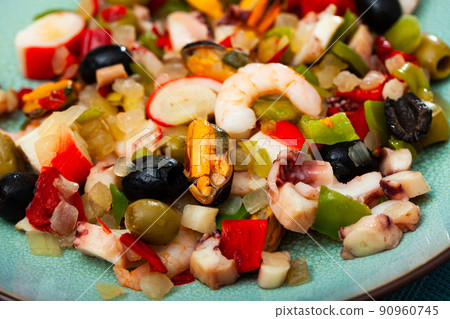 Seafood Salpicon with shrimp, mussels, octopus, vegetables and olives 90960745