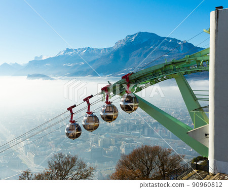 Cityscape with cable cars in Grenoble in autumn, France 90960812