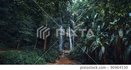 Waterfall in the tropical forest in the rainy season Waterfall in the tropical forest in the rainy season 90964530