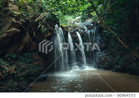Waterfall in the tropical forest in the rainy season Waterfall in the tropical forest in the rainy season 90964555