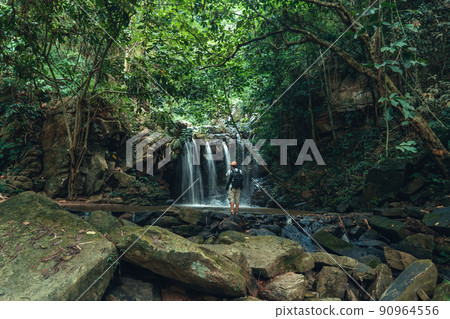 Waterfall in the tropical forest in the rainy season 90964556