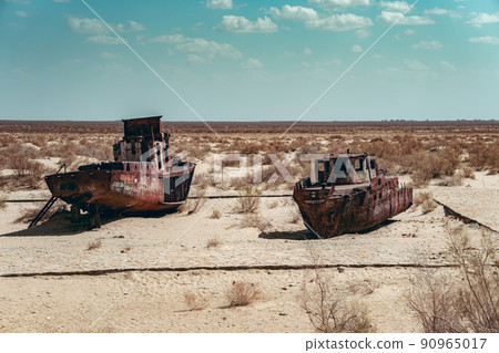 Abandoned old ships in desert in Moynaq, Uzbekistan Abandoned old ships in desert in Moynaq, Uzbekistan 90965017
