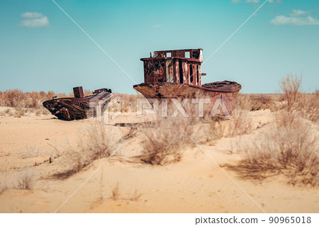 Abandoned old ships in desert in Moynaq, Uzbekistan Abandoned old ships in desert in Moynaq, Uzbekistan 90965018