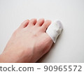 紗布，包紮婦女的腳趾。拇指受傷 90965572