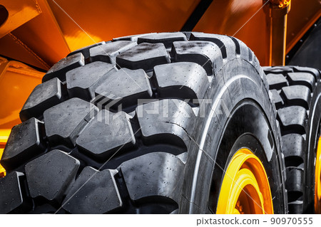 protector of a large rubber wheel. Rubber tire from the tipper, tractor, bulldozer 90970555