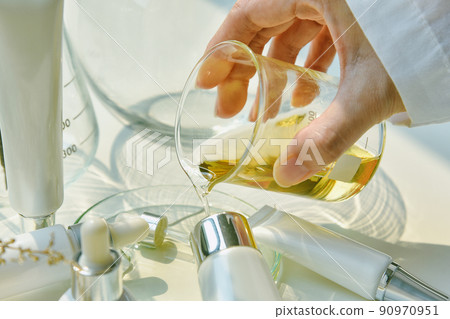 Scientist mixing natural skin care beauty products, Organic botany extraction 90970951