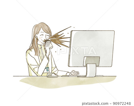 A woman spouting a drink while looking at a computer 90972248
