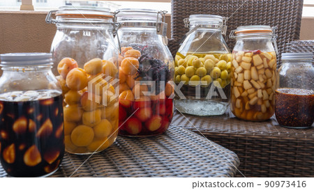 Umeboshi pickled in a fruit liquor bottle, plum wine, garlic pickled in soy sauce, scallions pickled in sweet and sour sauce 3 90973416