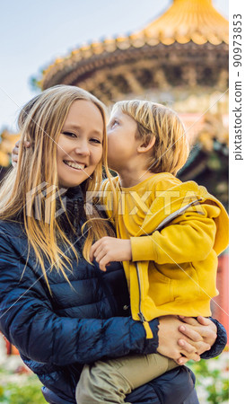 Enjoying vacation in China. Mom and son in Forbidden City. Travel to China with kids concept. Visa free transit 72 hours, 144 hours in China VERTICAL FORMAT for Instagram mobile story or stories size Enjoying vacation in China. Mom and son in Forbidden City. Travel to China with kids concept. Visa free transit 72 hours, 144 hours in China VERTICAL FORMAT for Instagram mobile story or stories size 90973853