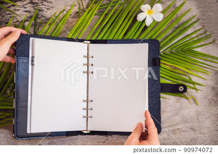 Notepad and stationery on wooden background. Planner for business and study. Fans of stationery 90974072