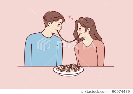 Happy couple eating pasta on date Happy couple eating pasta on date 90974489