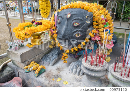 The sculpture of holy monster named '4 ears and 5 eyes' from the local fairy tales in Wat Phra That Doi Khao Kwai of Chiang Rai province, Thailand. The sculpture of holy monster named '4 ears and 5 eyes' from the local fairy tales in Wat Phra That Doi Khao Kwai of Chiang Rai province, Thailand. 90975130