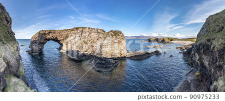 Aerial view of the Great Pollet Sea Arch, Fanad Peninsula, County Donegal, Ireland 90975233