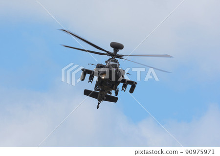 British Army WAH-64 Apache attack helicopter on the clouds British Army WAH-64 Apache attack helicopter on the clouds 90975971