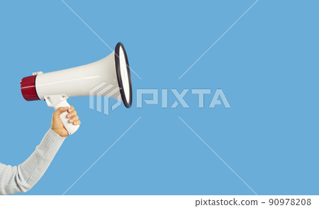 Person hold loudspeaker make announcement Person hold loudspeaker make announcement 90978208