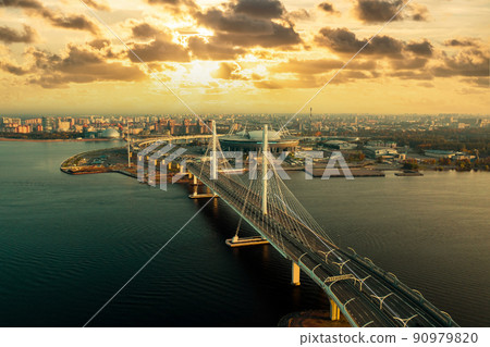 Aerial view of the Gulf of Finland, Saint-Petersburg, Russia, with a stadium, western rapid diameter and cable-stayed bridge 90979820