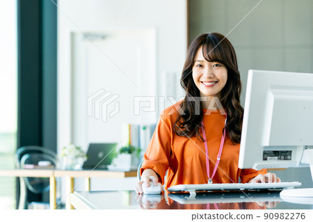 A young female engineer in the office A young female engineer in the office 90982276