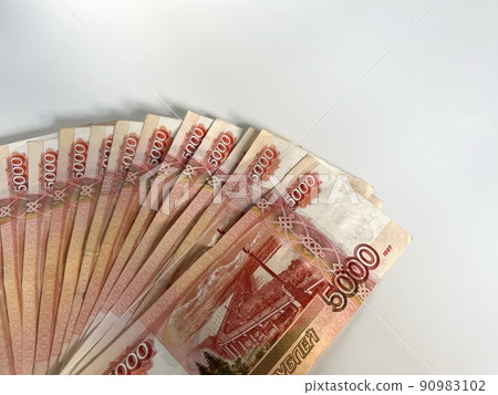 Fan of five thousand roubles banknotes. Russian currency on white background Fan of five thousand roubles banknotes. Russian currency on white background 90983102
