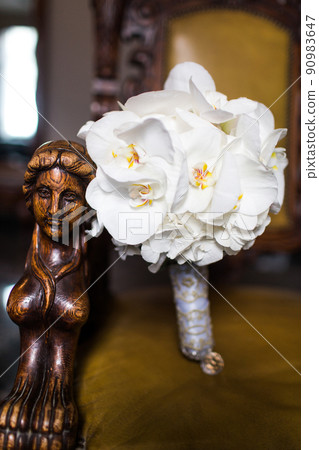 Colorful wedding bouquet on a vintage chair Colorful wedding bouquet on a vintage chair 90983647