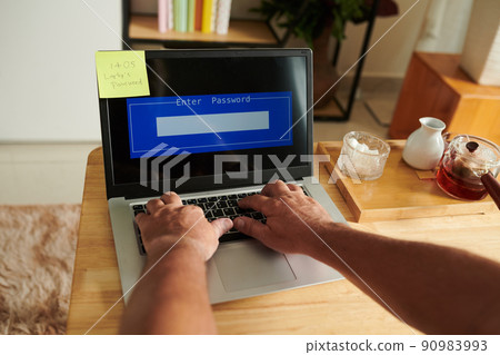 Hands of Man Entering Password Hands of Man Entering Password 90983993