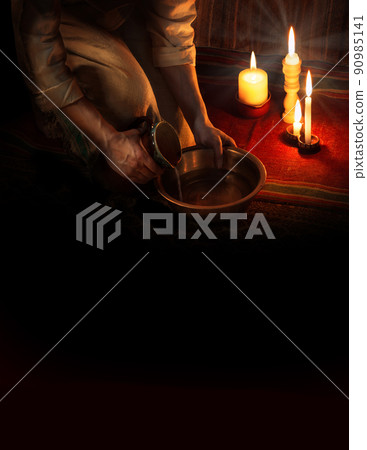 Man pours water into a bowl Man pours water into a bowl 90985141