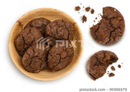 chocolate cookies in wooden bowl isolated on white background with full depth of field. Top view. Flat lay chocolate cookies in wooden bowl isolated on white background with full depth of field. Top view. Flat lay 90986879